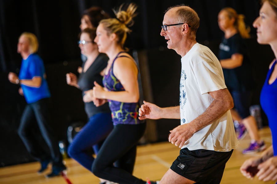 Adults Taking Part In A Fitness Class