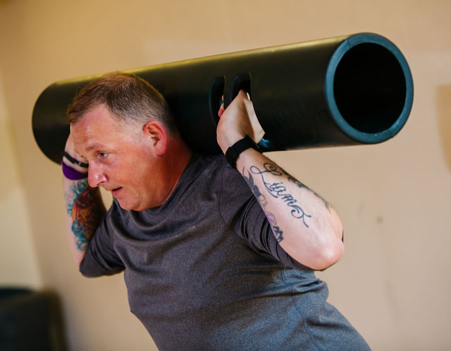 Adult Taking Part In A viPr Fitness Class