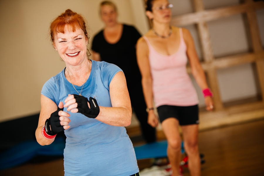 Adult Exercising In A Strong By Zumba Fitness Class